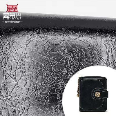 Punti salienti del PVC all'ingrosso di 006: Punti salienti: motivo a grana fulmine, pelle sintetica artificiale, portafogli, scatole, scarpe, quaderni, tessuto