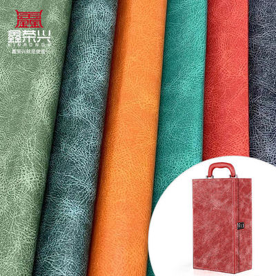 Tissu in pelle sintetica stampato in PVC impermeabile a motore a olio per notebook / tappetino da tavolo / scatola di imballaggio con conchiglia per telefono per borse artigianali