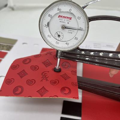 Pelle sintetica pressata in PU per borsa da scarpe confezione tappetino da tavolo tessuto di pelle sintetica finta