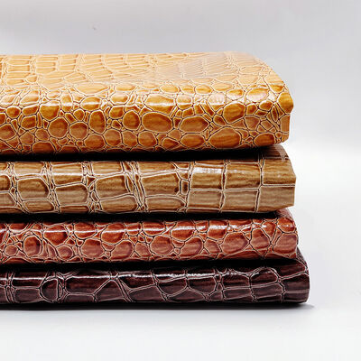 Vendita a caldo PVC lucido di alta lucentezza pelle sintetica in pietra in rilievo per scarpe borse quaderni mobili uso