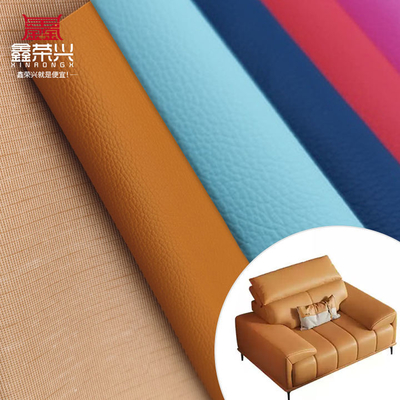 Ingrosso Litchi in rilievo PVC a maglia impermeabile pelle sintetica artificiale per divani sedie mobili materiale di pelle finta